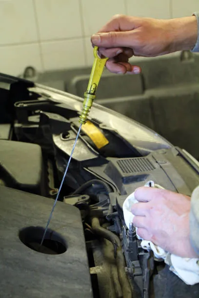 mechanic check the oil